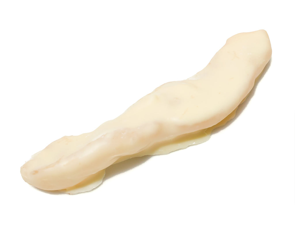 Getrocknete Melonenstücke schokoliert